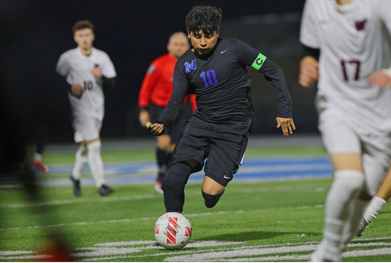 McNary HS Boys Soccer Team - moving with ball downfield