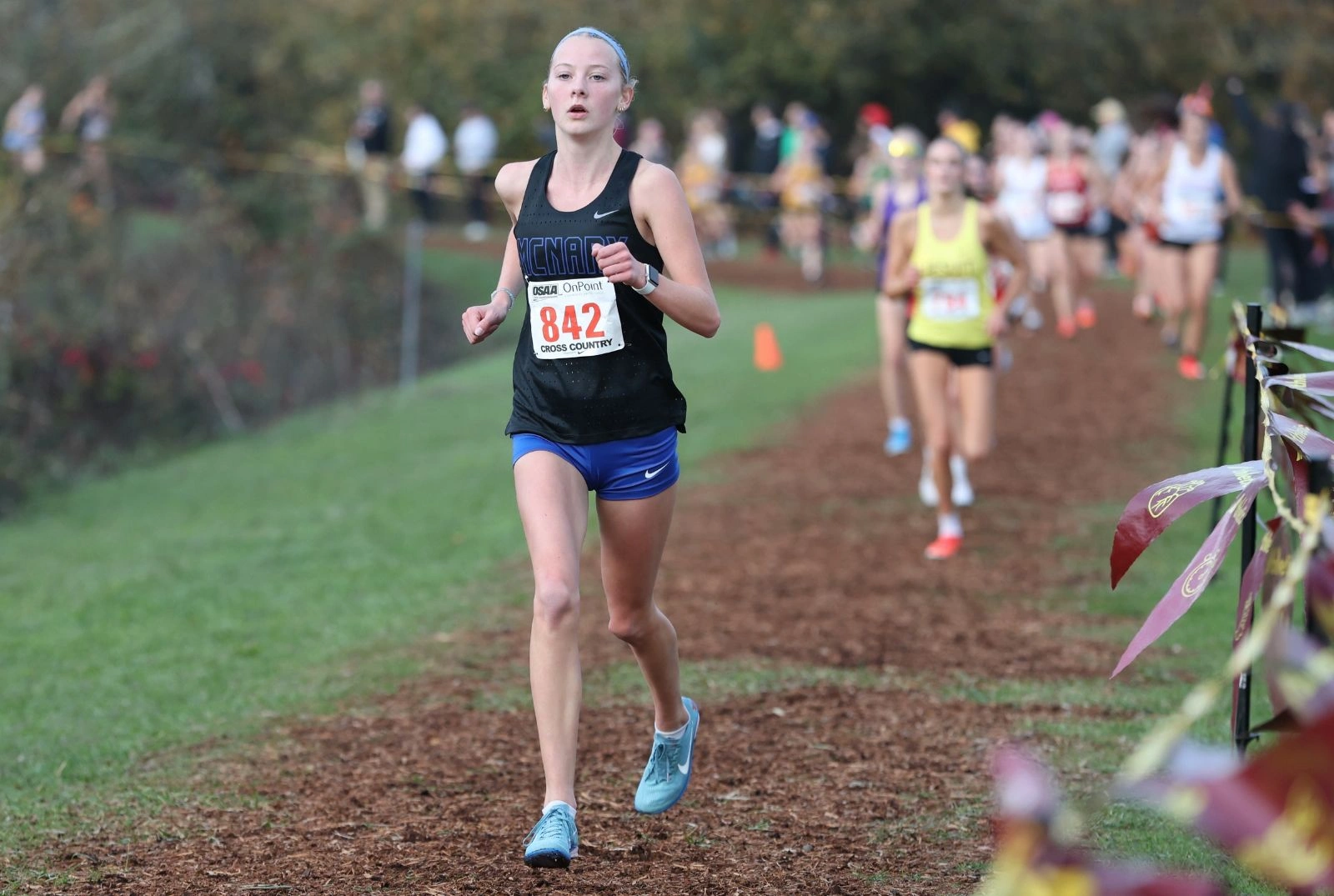 McNary HS Girl's Cross Country race - one McNary girl in the lead.