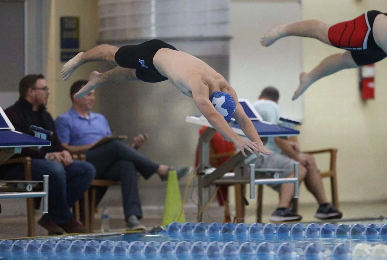McNary HS Football Team in Huddle with Coaches